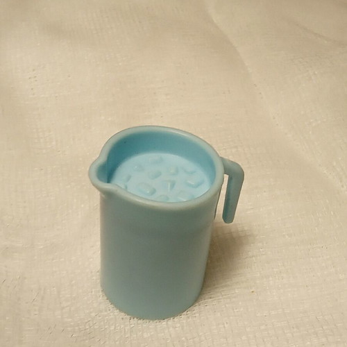 Large miniature pitcher with ice cubes plastic