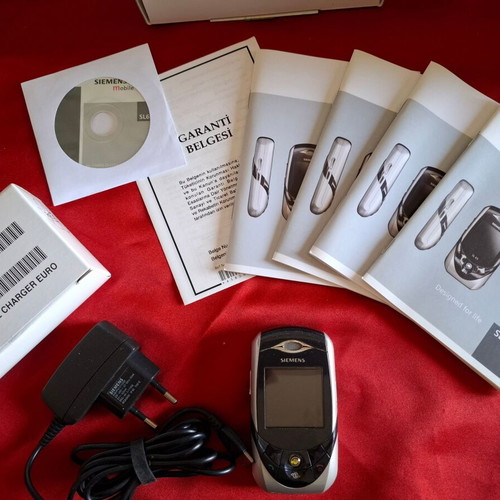 Siemens SL65 Ebony collectible cell phone used with packaging and accessories