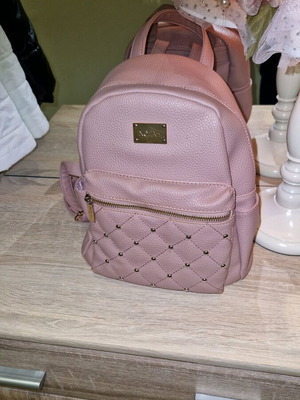 Faux leather backpack new in rotten apple color with studs