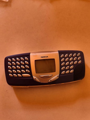 Nokia 5510 mobile phone for repair or spare parts with charger