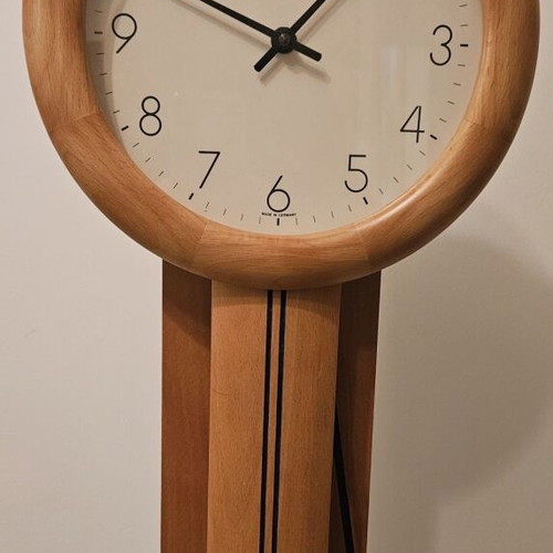 Hermle wall clock with pendulum like new, solid wood