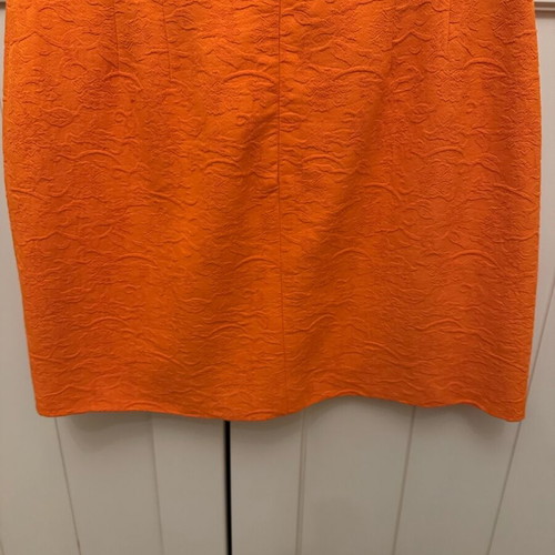 Karen Millen mini skirt orange brocade like new, UK size 12