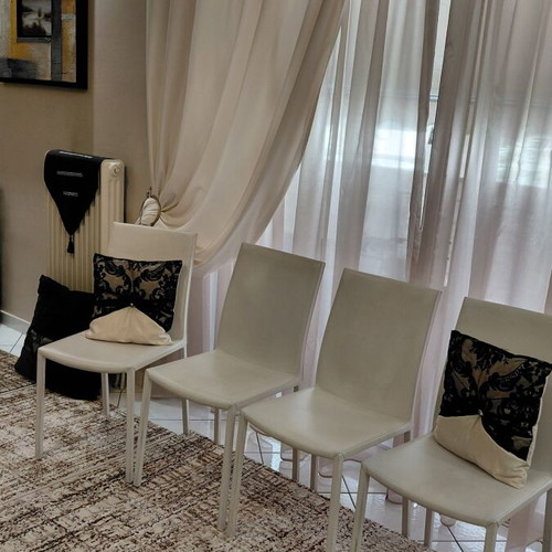 Leather chairs used, white with metal frame, set of 4