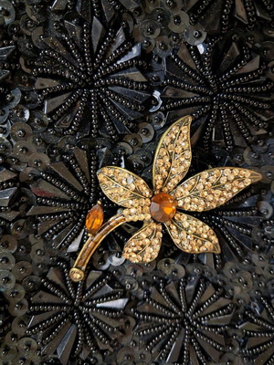 Vintage pin used in orange tones