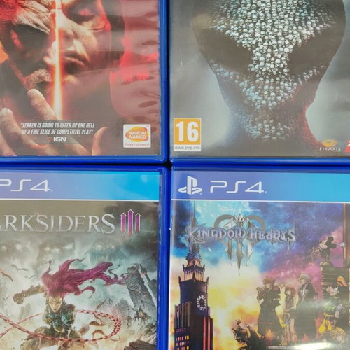PlayStation 4 Slim like new with 2 controllers and 10 games