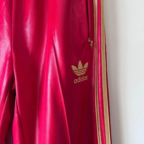 Adidas women's pants, size L, red with gold stripes