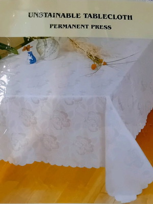 Ivory tablecloth with embossed design, 1980s