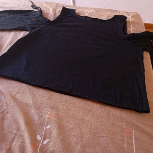 H&M black blouse with shoulder cutouts and cords, new