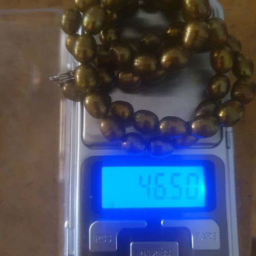 Necklace with natural pearls like new, khaki color, silver clasp