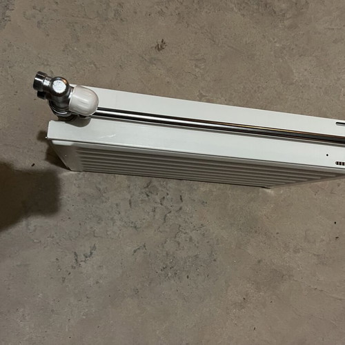 Used two-column radiator 60x40 cm with new switch and metal pipe