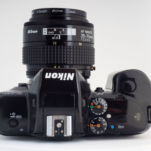 Nikon F-401X 35mm film camera with original leather strap