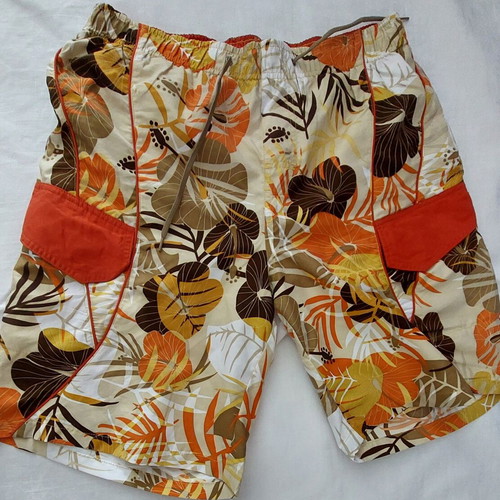 Men's swim shorts like new, printed earth tones, size L