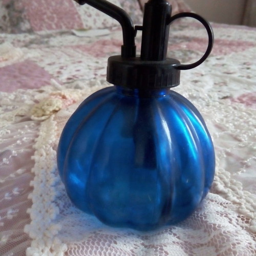 Antique cologne atomizers used, blue and purple