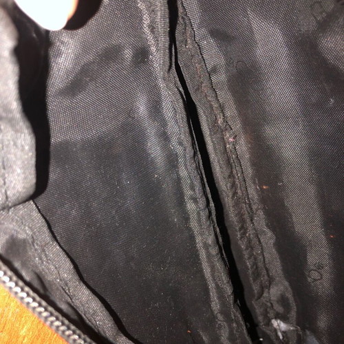 Polo pencil case used with slight ink on lid