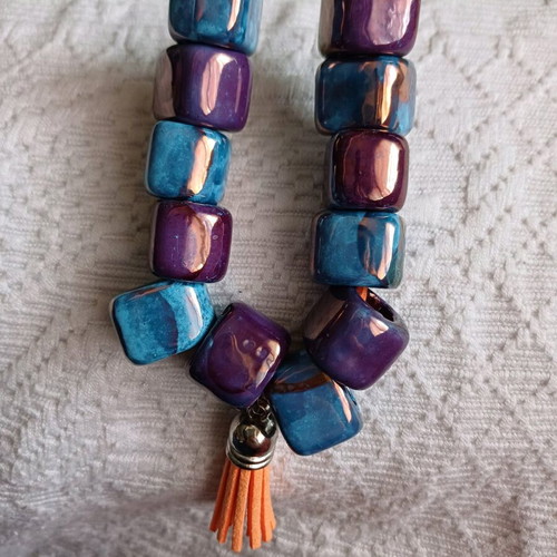 Necklace new from leather and ceramic beads