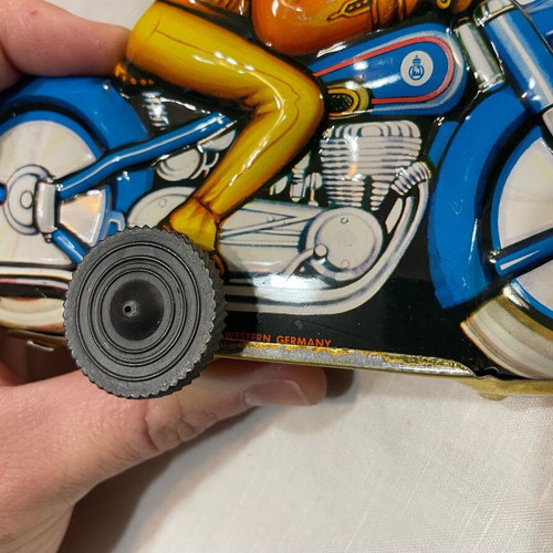 Motorcyclist vintage tin toy made in West Germany like new