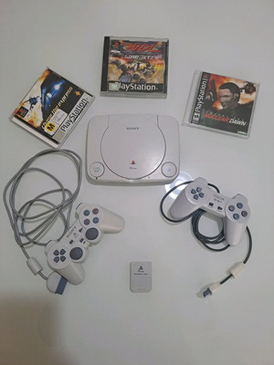 PS1 Slim console like new with memory card, 2 joysticks and 3 games
