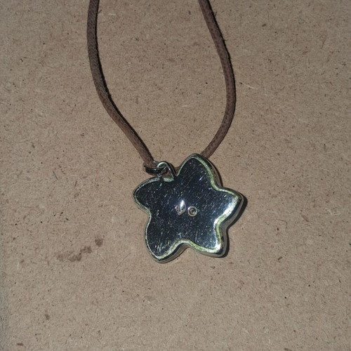 Swarovski vintage flower pendant with brown cord like new