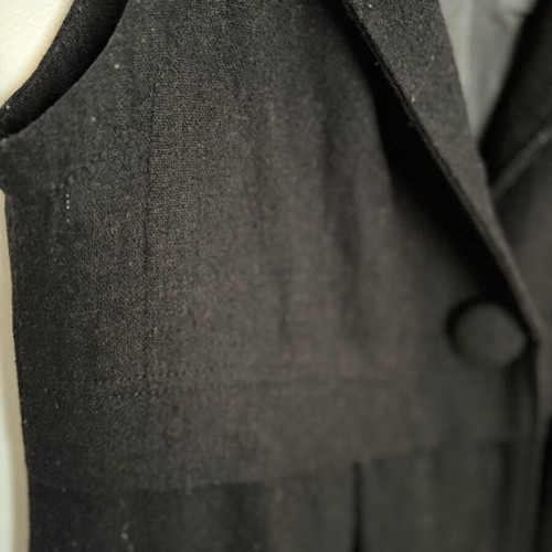 Black Sleeveless Coat size M used with minor wear