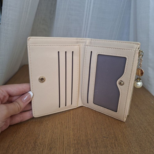 Wallet used with small marks on back