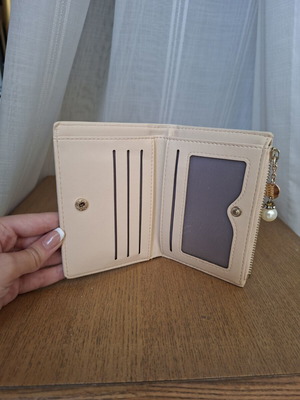 Wallet used with small marks on back
