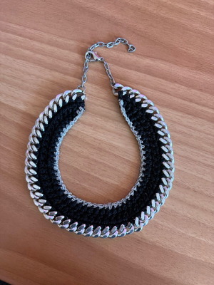 Handmade knitted necklace like new with silver chain and black color