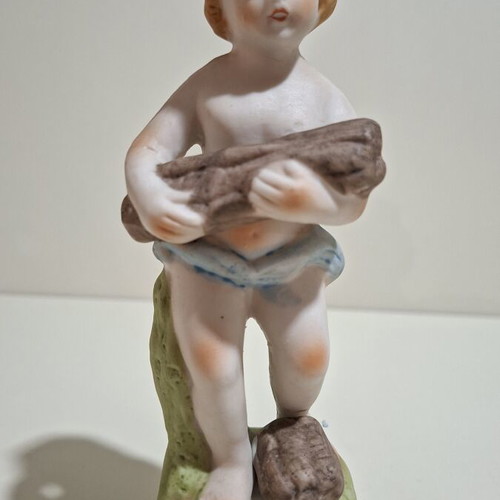 Porcelain figurine of a child vintage, like new