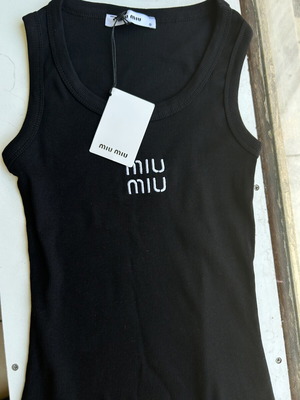 Miu Miu sleeveless blouse size L, new, black