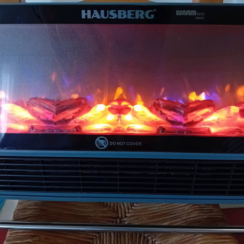 Air Heater Fireplace like new with remote control