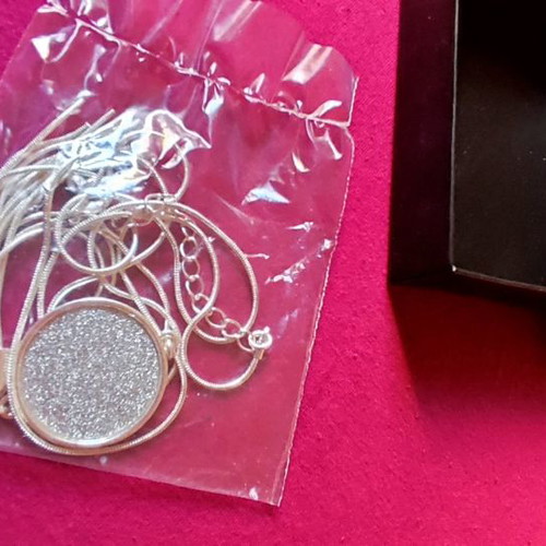 Long silver necklace new in metal