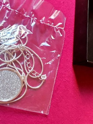 Long silver necklace new in metal