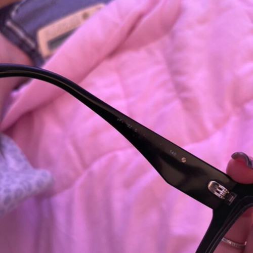 Prada eyeglasses black used with replaceable lenses