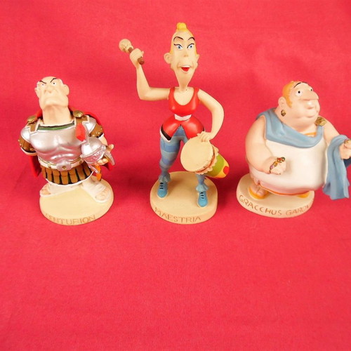 Three collectible figurines from Asterix & Ovelix comic made of paste