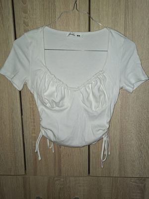 White crop top XS with side ties and ruched bust