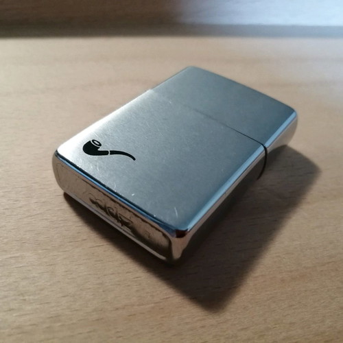 Zippo lighter used with decorative graphic