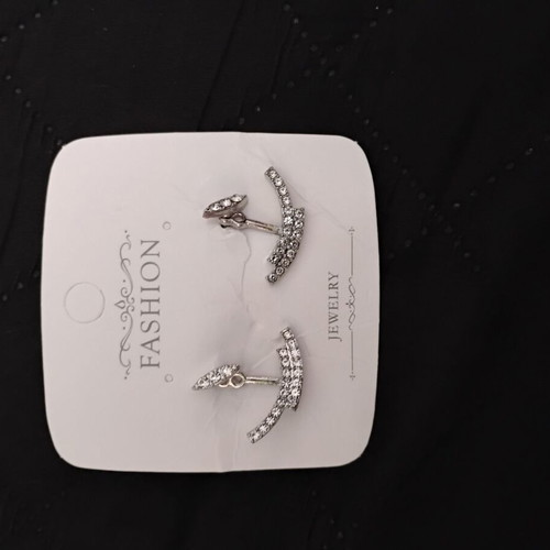 Earrings new, original design, silver color