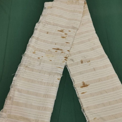 Woven bed sheet used with time stain from 1920 era
