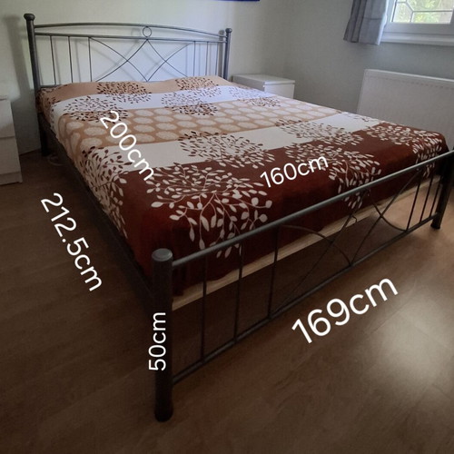 Double bed with metal frame and orthopedic mattress