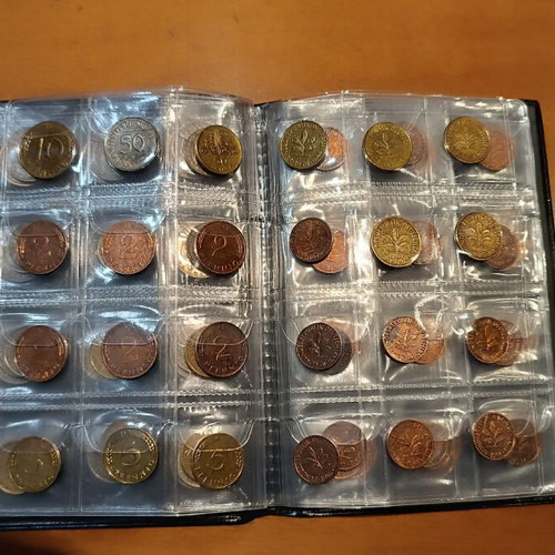 Album of 120 collectible coins from 7 countries