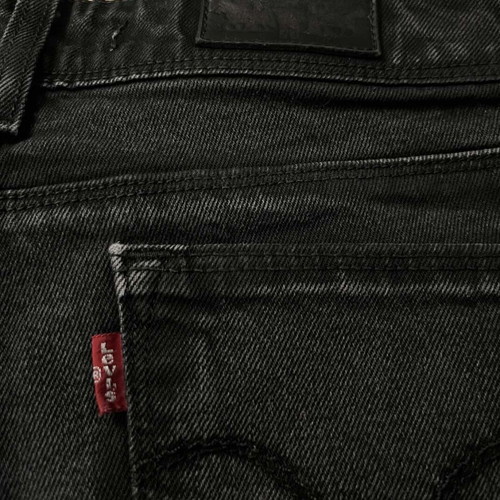 Levi's 570 black jeans used, low-waist with faded effect