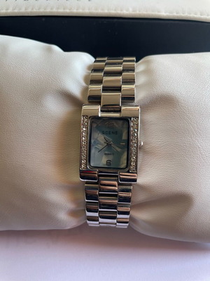 Women's watch used with blue dial and diamonds