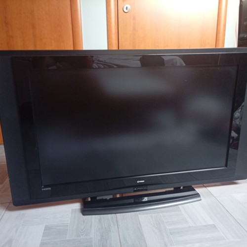 Funai 37-inch TV used with universal remote and decoder
