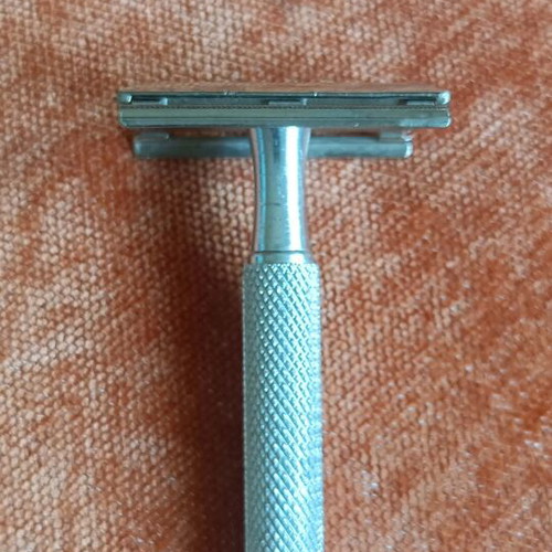 Vintage twist-to-open safety razor used