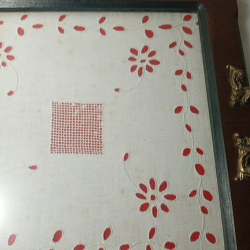 Traditional wooden serving tray used with handmade embroidery