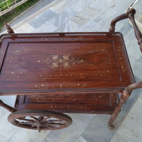 Wooden bar trolley with copper leaf design used
