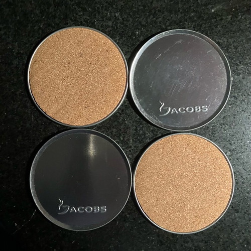 Jacobs coffee collectible coasters set of 4, metal with cork base