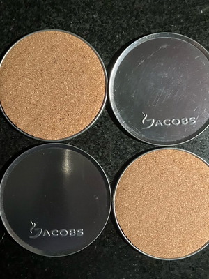 Jacobs coffee collectible coasters set of 4, metal with cork base