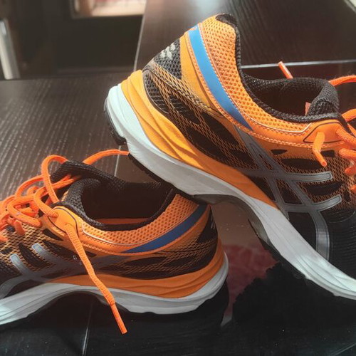 Asics Cumulus 17 running shoes, size 38, black and orange