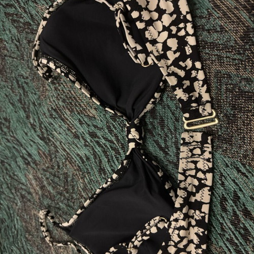 Swimwear top used, black and white, sizes S and M