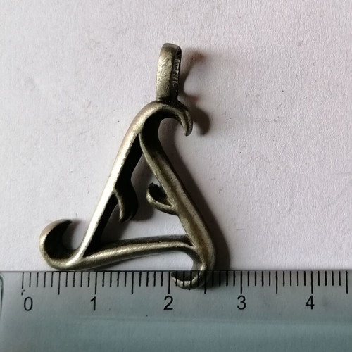Metal tribal triangle pendant new with matte finish